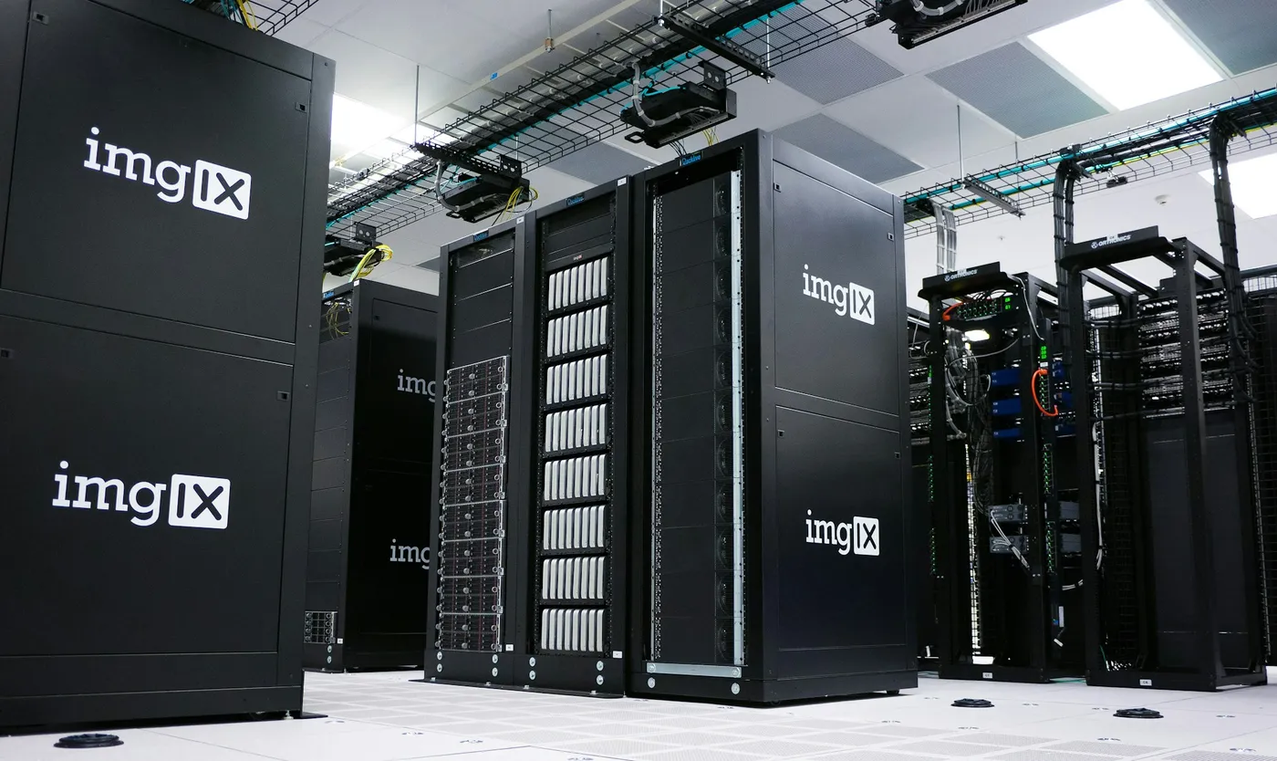 Rows of black server racks in a data centre